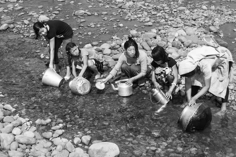 Rural Drinking Water Challenges - Fetching water from a mountainous river in East Siyang district, Arunachal Pradesh